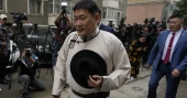Mongolia's prime minister resigns after losing a parliament vote of confidence after protests