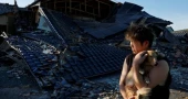 Death toll from Japan earthquake rises to 34 as survivors struggle with heat, water shortages