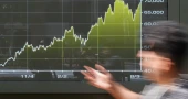 Oil prices ease as Asian shares rise, following Wall Street gains