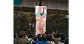 DU students throw shoes at redrawn image of Hasina on metro rail pillar