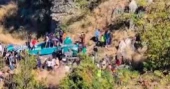 At least 36 dead after overcrowded and dilapidated bus skids into a deep gorge in northern India