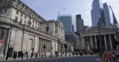 Bank of England keeps its main interest rate on hold at 5% in wake of big US Fed rate cut