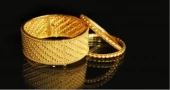 Bajus cuts gold prices a day after hike