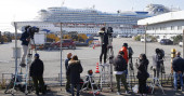Japan confirms 99 more cases of new virus on cruise ship