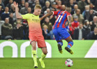 Man City beats Palace 2-0 to keep up pressure on Liverpool