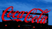 Coke shares hit all-time high as new drinks win customers