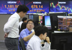  Asian shares mixed in lackluster trading, Nikkei falls 0.6%