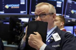 Stocks close higher following solid earnings results