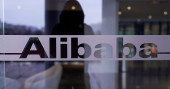 E-commerce giant Alibaba raises $11 billion in share listing
