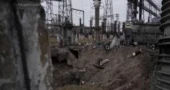 In Ukraine, power plant workers fight to save their 'child'