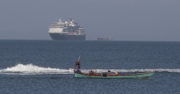 Cruise ship turned away in other ports anchors off Cambodia