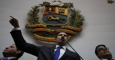 Venezuela opposition charges congress and swears in leader