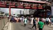 RMG workers block Mirpur roads for wages, Eid bonus
