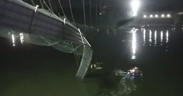 At least 91 killed in India bridge collapse