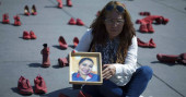 In Mexican capital, red shoes to protest killings of women