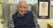 World’s oldest man says secret to his long life is luck, fish and chips