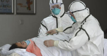 WHO says prepare for local outbreaks; China slams US control