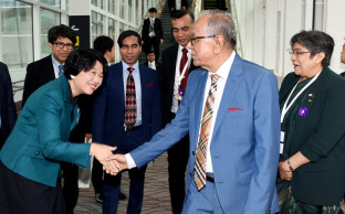 President reaches Singapore en route to Dhaka