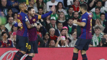 Rival fans cheer as brilliant Messi scores 3 for Barcelona