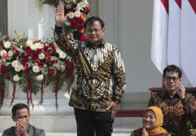 Indonesia president names election rival as defense minister