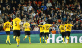 Valencia wins again, stays in contention in Champions League