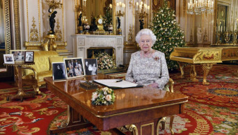 Queen Elizabeth II riffs on wisdom, family's busy year