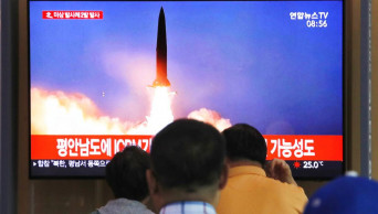North Korea fires 2 projectiles after offering talks with US