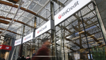 Iran sanctions, Turkish write-down hit UniCredit profit