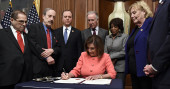 Nancy Pelosi hands out impeachment pens, a signing tradition