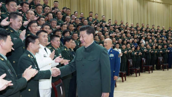 Xi meets delegates to PLA logistic support force Party congress, senior officers in Hubei