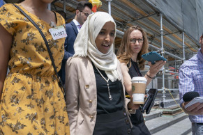 Trump disavows 'send her back' cry, Omar stands defiant