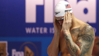 Caeleb Dressel breaks Phelps' world record in 100 butterfly