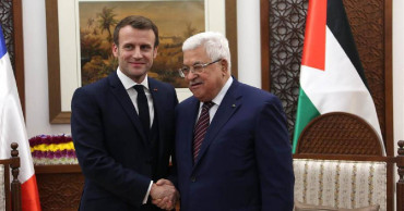 Palestinian president meets Macron over efforts to save two-state solution