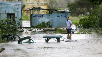 Typhoon kills 12 in Philippines, heads to southern China