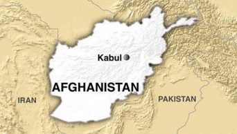Taliban target military base, police center, killing 12