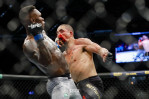 Israel Adesanya unifies UFC middleweight title with stunning knock-out victory over Robert Wittaker