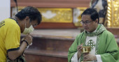 No handshakes: Viral outbreak spooks Asian places of worship
