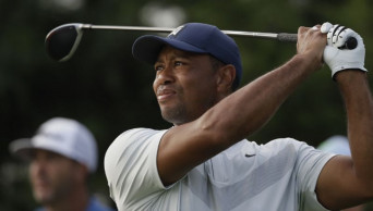 Woods shows up in Chicago, has work to do to reach Atlanta