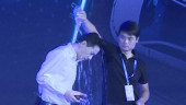 Baidu chief doused with water at AI event