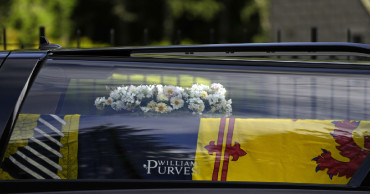 Queen’s coffin leaves Scottish estate for last journey back to London