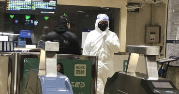 China building a hospital to treat virus, expands lockdowns