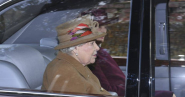 Queen attends church on eve of meeting over Harry and Meghan