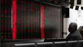 Asia shares mixed, Shanghai gains after Apple sales warning