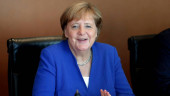 Germany's Merkel faces balancing act in Beijing