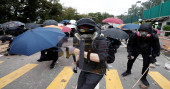 Violence in Hong Kong universities takes “another step towards terrorism”: police