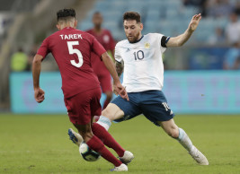 Argentina beats Qatar to escape elimination at Copa America