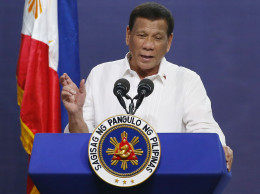 Duterte in China amid expectation he'll raise sea disputes