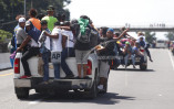 Ragged, growing caravan of migrants resumes march toward US