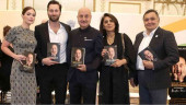 Rishi Kapoor releases Anupam Kher’s autobiography in New York