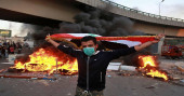 Protester killed in clashes as Iraq tries to reopen port